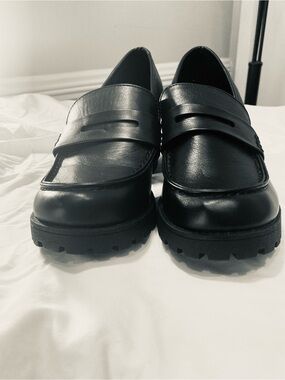 Soda Black Leather Penny Loafers with Lug Sole